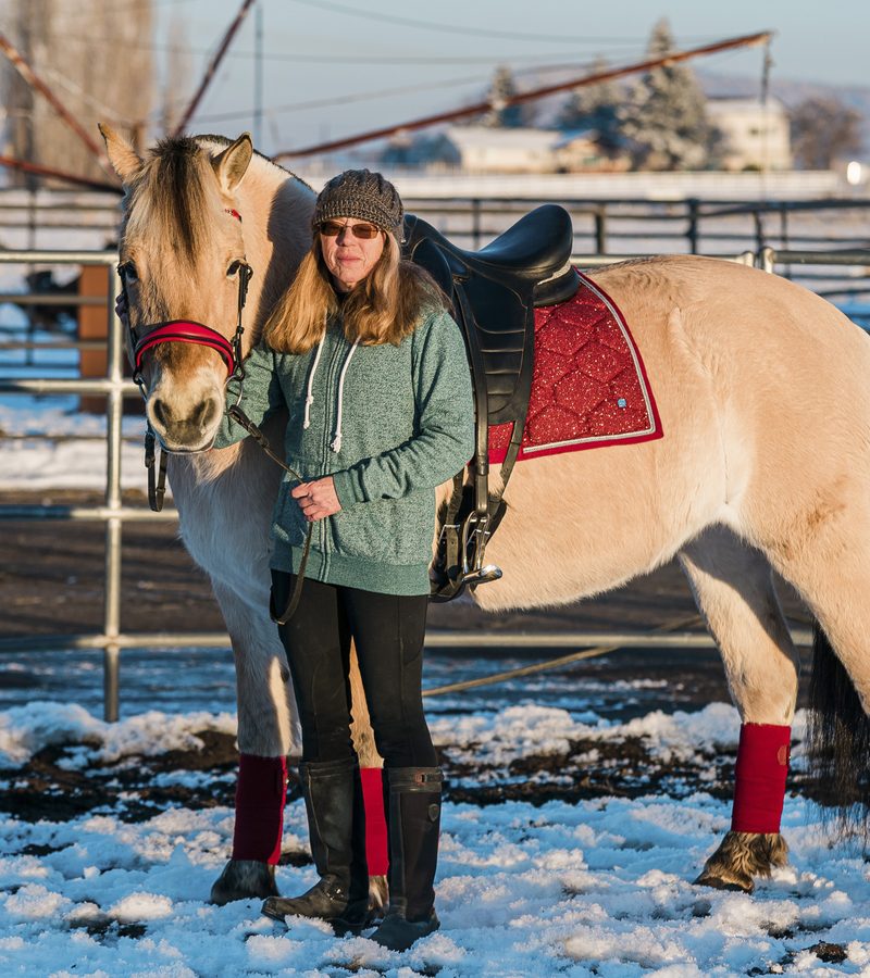 Maria Meister with a horse in the snow